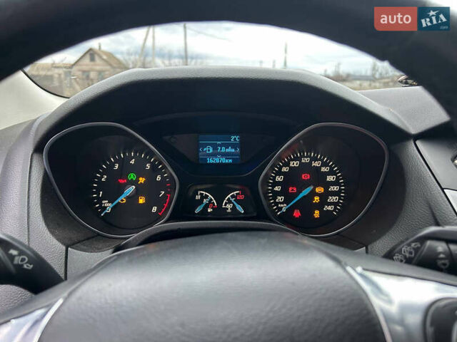 Серый Форд Фокус, объемом двигателя 1 л и пробегом 162 тыс. км за 6800 $, фото 7 на Automoto.ua