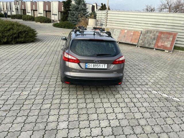 Сірий Форд Фокус, об'ємом двигуна 1 л та пробігом 213 тис. км за 6600 $, фото 4 на Automoto.ua