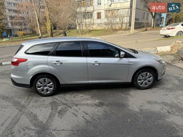 Серый Форд Фокус, объемом двигателя 1.6 л и пробегом 297 тыс. км за 7500 $, фото 2 на Automoto.ua