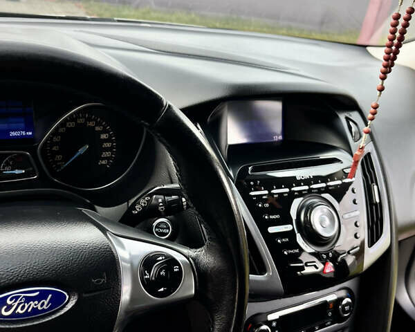Сірий Форд Фокус, об'ємом двигуна 1.6 л та пробігом 259 тис. км за 8400 $, фото 17 на Automoto.ua