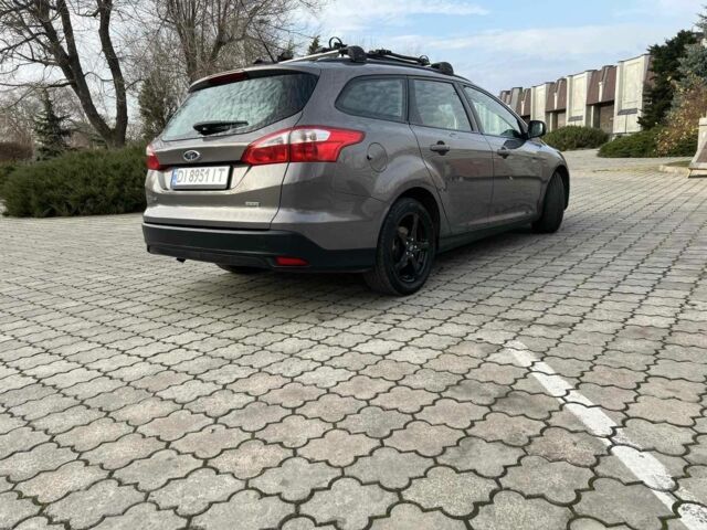 Сірий Форд Фокус, об'ємом двигуна 1 л та пробігом 213 тис. км за 6600 $, фото 10 на Automoto.ua