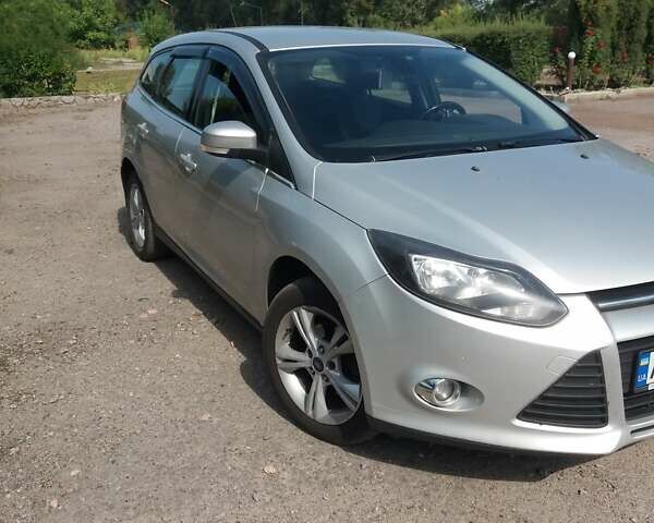 Серый Форд Фокус, объемом двигателя 1 л и пробегом 300 тыс. км за 7333 $, фото 2 на Automoto.ua