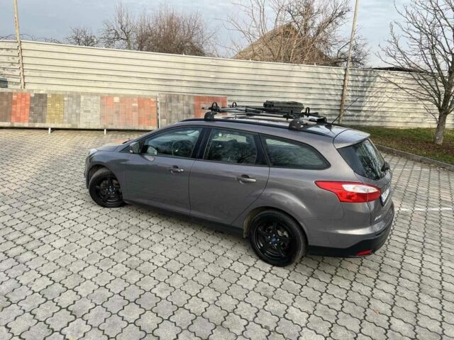 Сірий Форд Фокус, об'ємом двигуна 1 л та пробігом 213 тис. км за 6600 $, фото 5 на Automoto.ua
