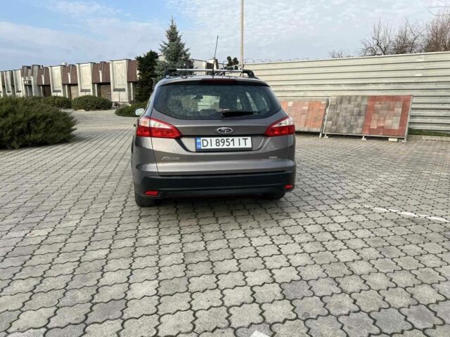 Сірий Форд Фокус, об'ємом двигуна 1 л та пробігом 213 тис. км за 6600 $, фото 3 на Automoto.ua