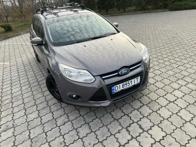 Сірий Форд Фокус, об'ємом двигуна 1 л та пробігом 213 тис. км за 6600 $, фото 17 на Automoto.ua