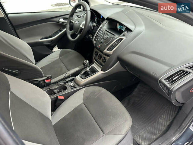 Сірий Форд Фокус, об'ємом двигуна 1.56 л та пробігом 205 тис. км за 8350 $, фото 19 на Automoto.ua