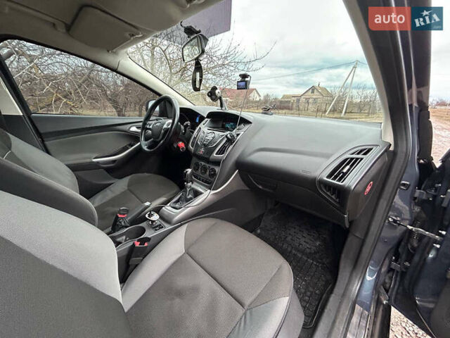 Серый Форд Фокус, объемом двигателя 1 л и пробегом 162 тыс. км за 6800 $, фото 10 на Automoto.ua