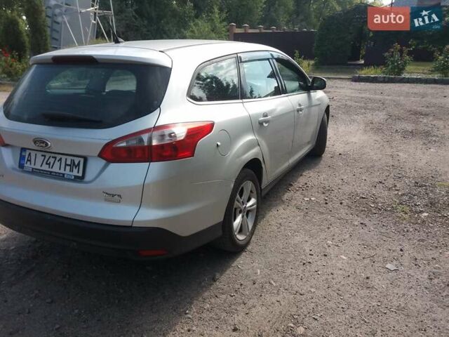 Серый Форд Фокус, объемом двигателя 1 л и пробегом 300 тыс. км за 7333 $, фото 6 на Automoto.ua