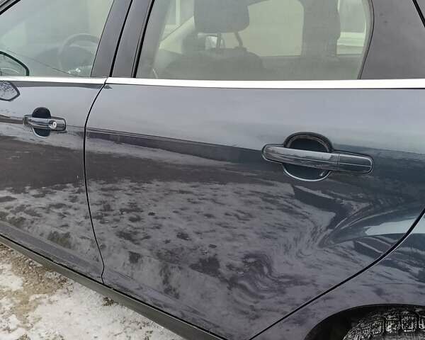 Сірий Форд Фокус, об'ємом двигуна 1 л та пробігом 168 тис. км за 6700 $, фото 7 на Automoto.ua