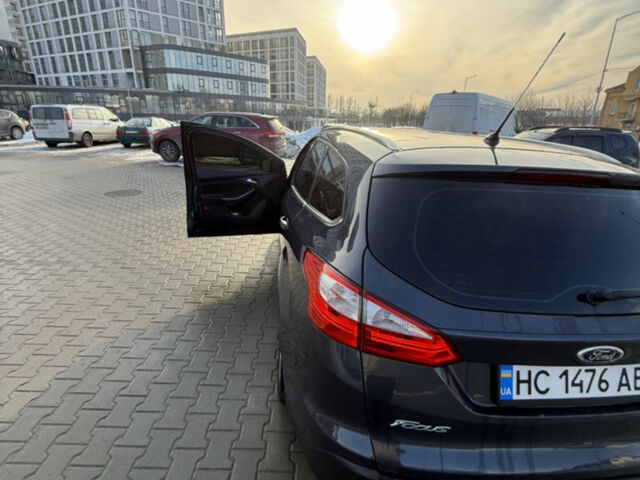 Сірий Форд Фокус, об'ємом двигуна 1.56 л та пробігом 203 тис. км за 8300 $, фото 9 на Automoto.ua