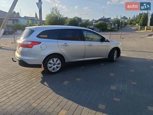 Сірий Форд Фокус, об'ємом двигуна 1.56 л та пробігом 237 тис. км за 8000 $, фото 4 на Automoto.ua