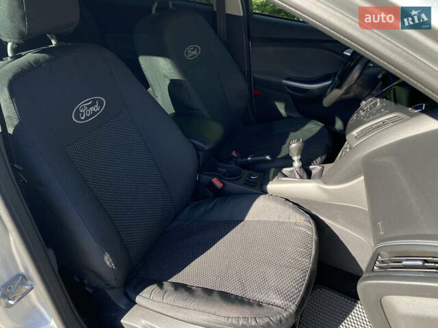Серый Форд Фокус, объемом двигателя 1.6 л и пробегом 242 тыс. км за 6750 $, фото 23 на Automoto.ua