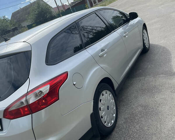 Серый Форд Фокус, объемом двигателя 1.6 л и пробегом 253 тыс. км за 7250 $, фото 4 на Automoto.ua