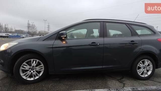 Сірий Форд Фокус, об'ємом двигуна 2 л та пробігом 212 тис. км за 7999 $, фото 4 на Automoto.ua