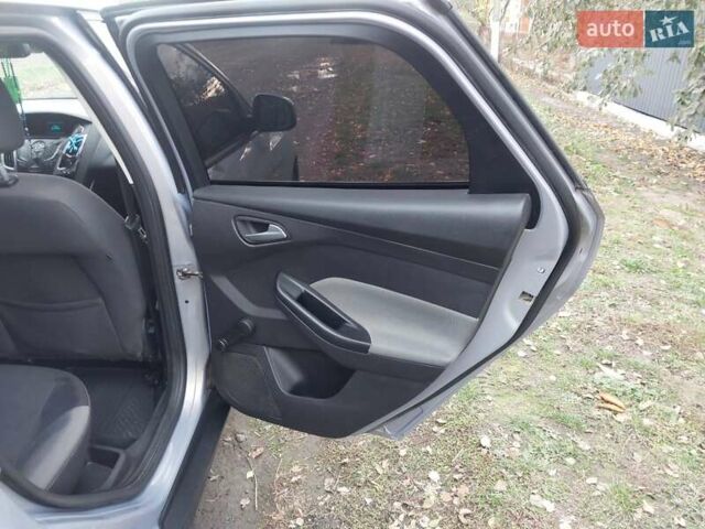 Серый Форд Фокус, объемом двигателя 1.6 л и пробегом 272 тыс. км за 7900 $, фото 8 на Automoto.ua