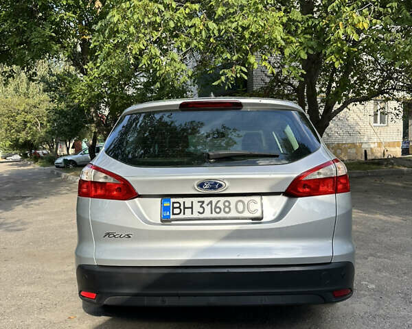 Серый Форд Фокус, объемом двигателя 1.56 л и пробегом 250 тыс. км за 7550 $, фото 6 на Automoto.ua