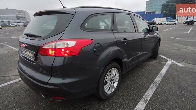 Сірий Форд Фокус, об'ємом двигуна 2 л та пробігом 212 тис. км за 7999 $, фото 7 на Automoto.ua
