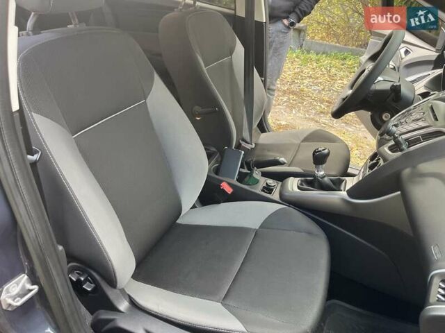 Форд Фокус 2014 у Нежине на Automoto.ua Сірий Форд Фокус, об'ємом двигуна 1.6 л та пробігом 230 тис. км за 8000 $, фото 19 на Automoto.ua