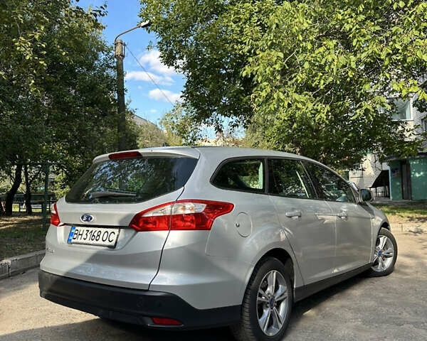 Серый Форд Фокус, объемом двигателя 1.56 л и пробегом 250 тыс. км за 7550 $, фото 7 на Automoto.ua
