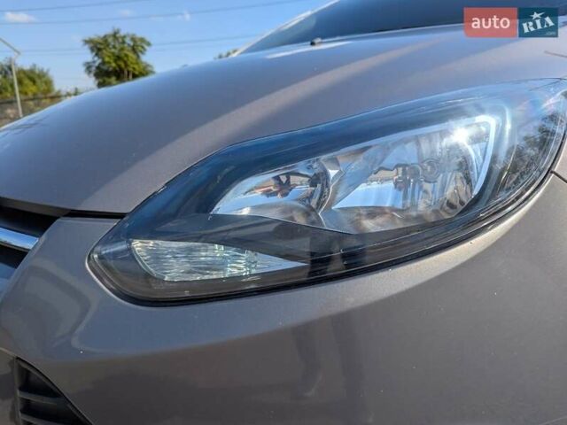 Сірий Форд Фокус, об'ємом двигуна 1 л та пробігом 222 тис. км за 6500 $, фото 7 на Automoto.ua