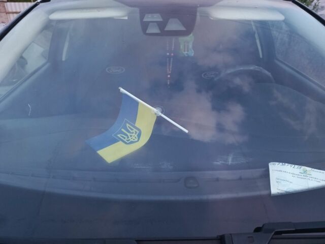 Серый Форд Фокус, объемом двигателя 1.5 л и пробегом 240 тыс. км за 8500 $, фото 2 на Automoto.ua