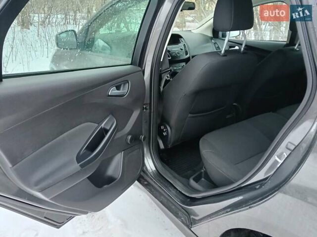 Серый Форд Фокус, объемом двигателя 1.5 л и пробегом 208 тыс. км за 7900 $, фото 16 на Automoto.ua