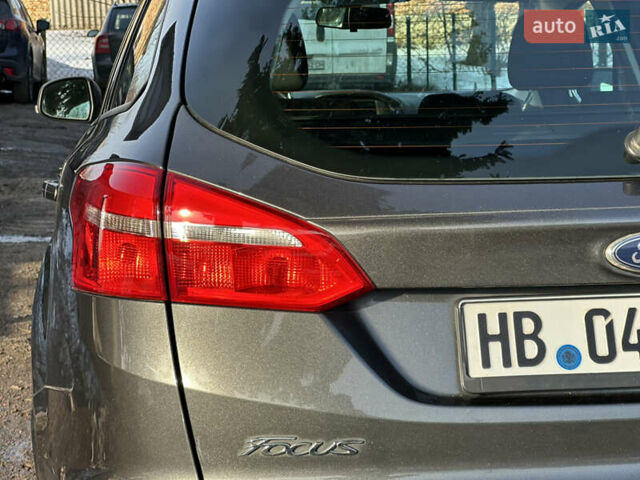 Серый Форд Фокус, объемом двигателя 1.5 л и пробегом 239 тыс. км за 8899 $, фото 10 на Automoto.ua