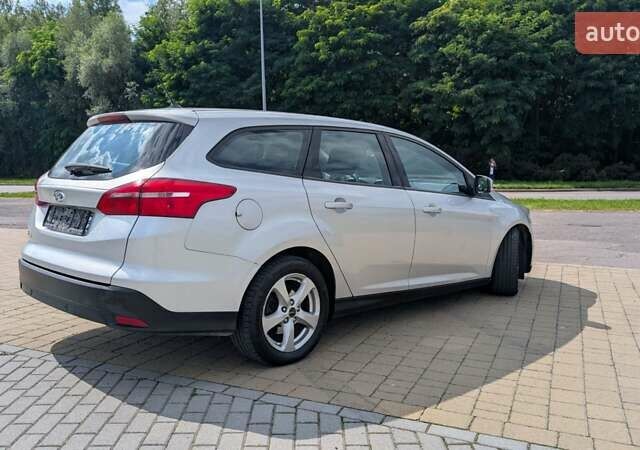 Серый Форд Фокус, объемом двигателя 1.5 л и пробегом 303 тыс. км за 9200 $, фото 26 на Automoto.ua