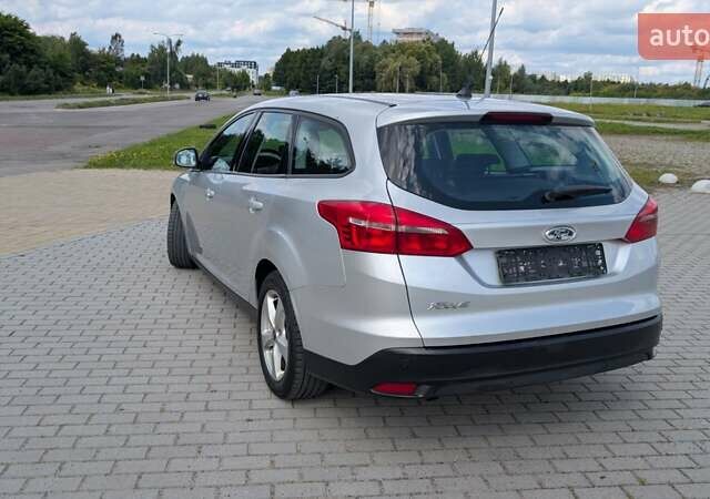 Серый Форд Фокус, объемом двигателя 1.5 л и пробегом 303 тыс. км за 9200 $, фото 1 на Automoto.ua