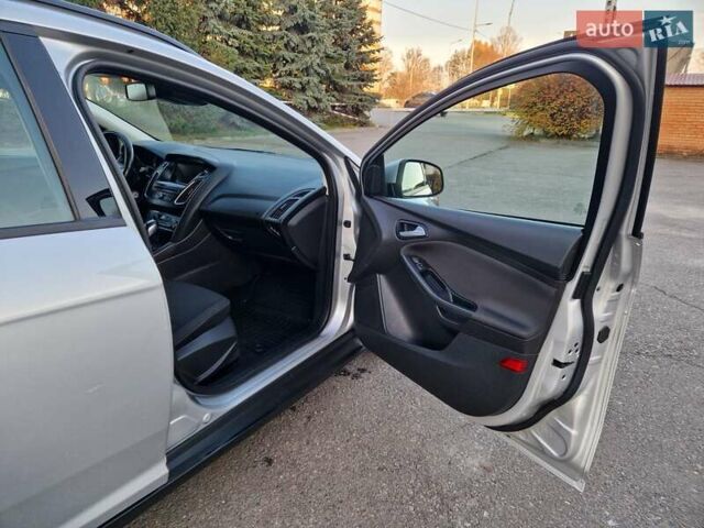 Серый Форд Фокус, объемом двигателя 1.5 л и пробегом 187 тыс. км за 9900 $, фото 12 на Automoto.ua