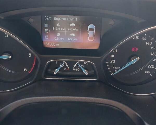 Серый Форд Фокус, объемом двигателя 1.5 л и пробегом 170 тыс. км за 12800 $, фото 16 на Automoto.ua