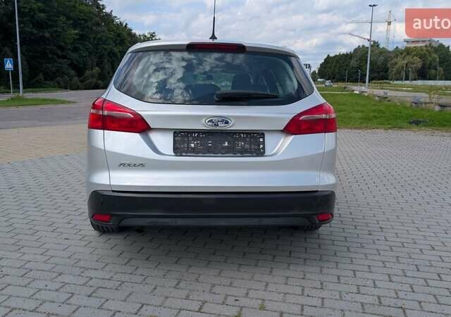 Серый Форд Фокус, объемом двигателя 1.5 л и пробегом 303 тыс. км за 9200 $, фото 7 на Automoto.ua