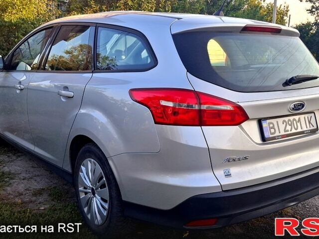 Серый Форд Фокус, объемом двигателя 1.5 л и пробегом 300 тыс. км за 9500 $, фото 2 на Automoto.ua