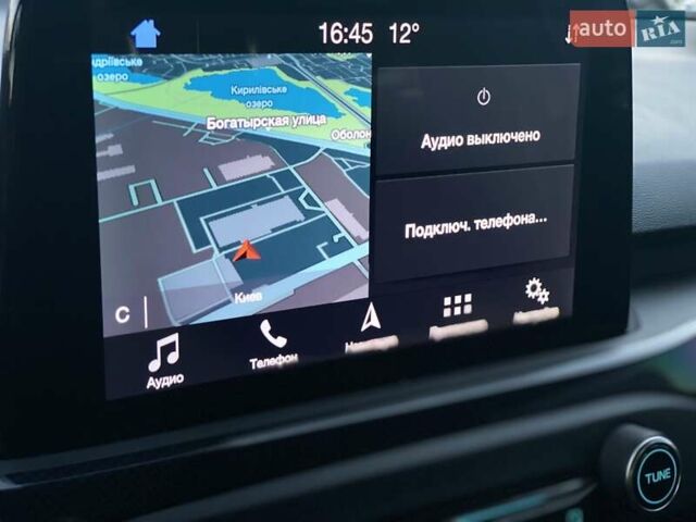 Серый Форд Фокус, объемом двигателя 1.5 л и пробегом 158 тыс. км за 14700 $, фото 10 на Automoto.ua