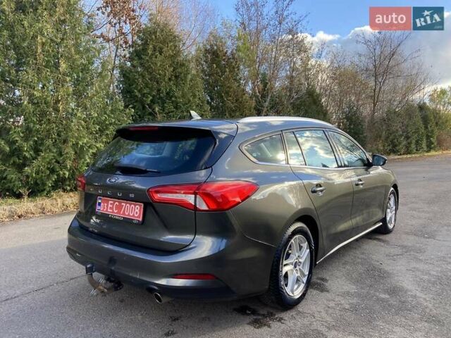Серый Форд Фокус, объемом двигателя 1.5 л и пробегом 193 тыс. км за 12700 $, фото 4 на Automoto.ua