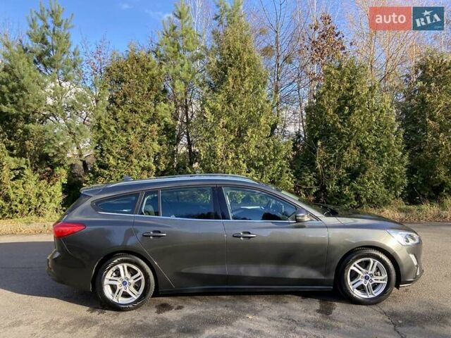 Серый Форд Фокус, объемом двигателя 1.5 л и пробегом 193 тыс. км за 12700 $, фото 3 на Automoto.ua