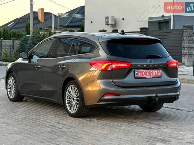 Сірий Форд Фокус, об'ємом двигуна 2 л та пробігом 235 тис. км за 12990 $, фото 5 на Automoto.ua