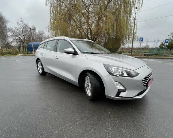 Серый Форд Фокус, объемом двигателя 1.5 л и пробегом 201 тыс. км за 13500 $, фото 2 на Automoto.ua