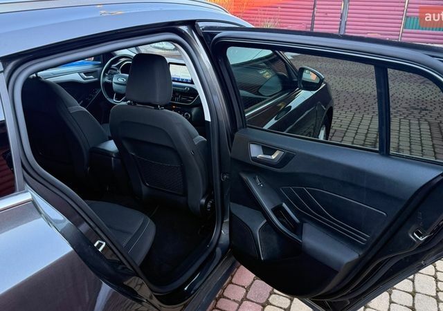 Серый Форд Фокус, объемом двигателя 1.5 л и пробегом 199 тыс. км за 14300 $, фото 23 на Automoto.ua