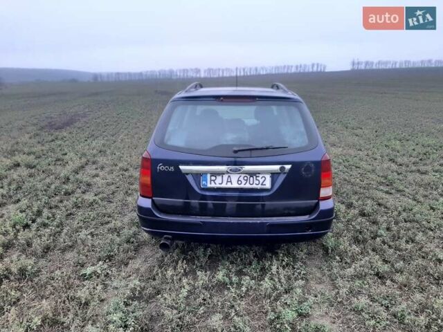 Синій Форд Фокус, об'ємом двигуна 1.6 л та пробігом 390 тис. км за 1100 $, фото 13 на Automoto.ua