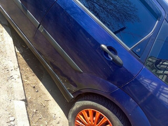 Синий Форд Фокус, объемом двигателя 1.8 л и пробегом 345 тыс. км за 1531 $, фото 5 на Automoto.ua