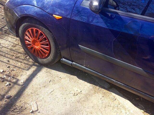 Синий Форд Фокус, объемом двигателя 1.8 л и пробегом 345 тыс. км за 1531 $, фото 6 на Automoto.ua