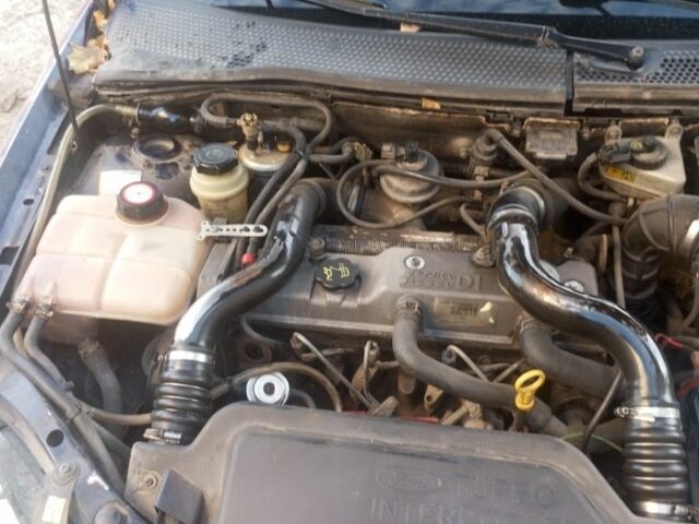 Синий Форд Фокус, объемом двигателя 1.8 л и пробегом 250 тыс. км за 1850 $, фото 6 на Automoto.ua