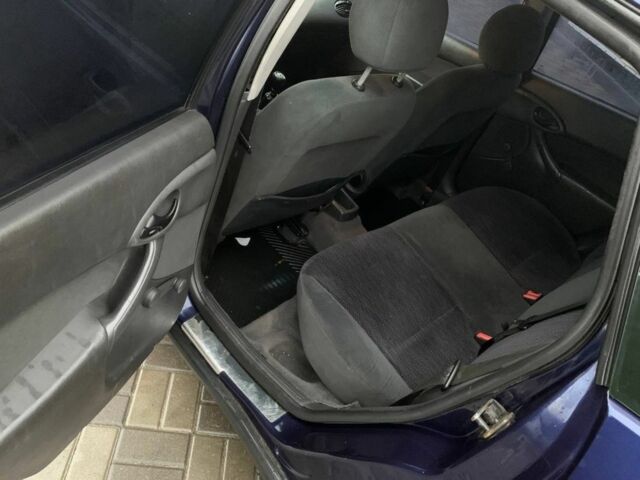 Синій Форд Фокус, об'ємом двигуна 1.8 л та пробігом 245 тис. км за 1400 $, фото 9 на Automoto.ua