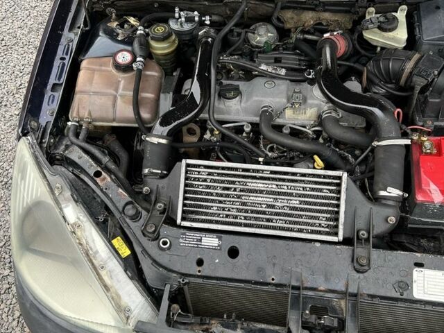 Синий Форд Фокус, объемом двигателя 1.8 л и пробегом 380 тыс. км за 850 $, фото 13 на Automoto.ua