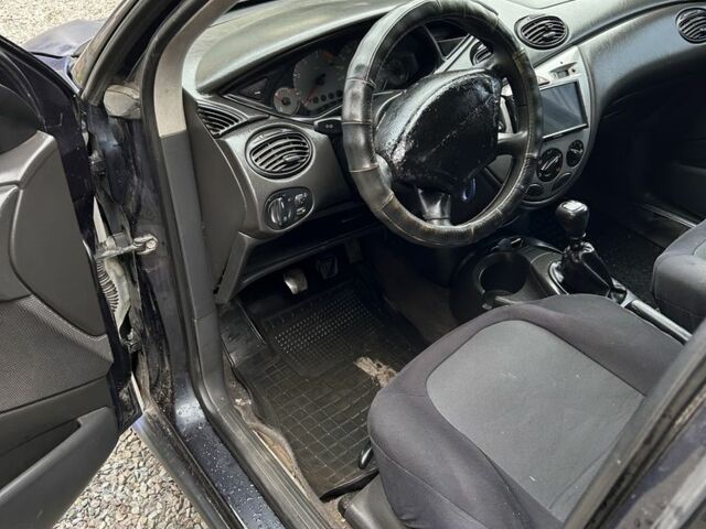 Синий Форд Фокус, объемом двигателя 1.8 л и пробегом 380 тыс. км за 850 $, фото 10 на Automoto.ua