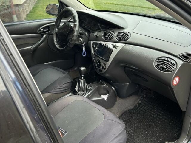 Синий Форд Фокус, объемом двигателя 1.8 л и пробегом 380 тыс. км за 850 $, фото 9 на Automoto.ua