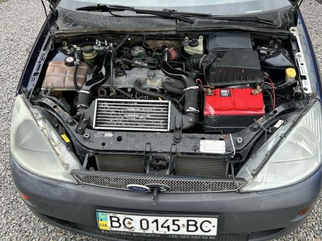 Синий Форд Фокус, объемом двигателя 1.8 л и пробегом 380 тыс. км за 850 $, фото 14 на Automoto.ua