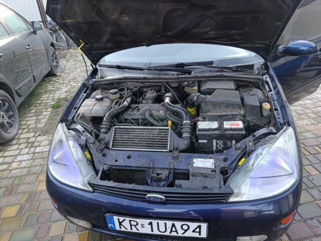 Синий Форд Фокус, объемом двигателя 1.8 л и пробегом 250 тыс. км за 950 $, фото 6 на Automoto.ua