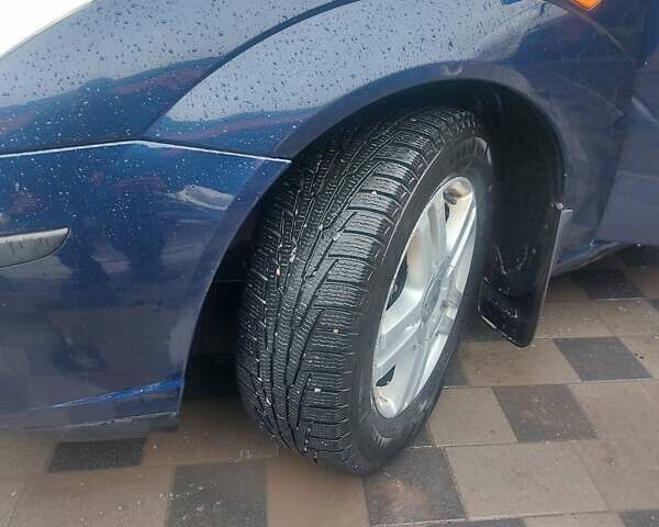 Синий Форд Фокус, объемом двигателя 1.4 л и пробегом 268 тыс. км за 3600 $, фото 8 на Automoto.ua